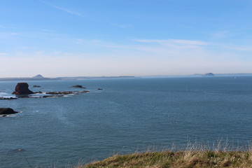 Fototapeta na wymiar Seascape scene with calm sea during the summer season in Scotland