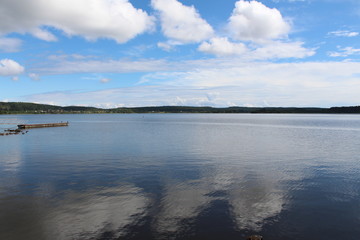 Calm and still lake during the summer in rural Russia