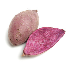 Purple Colored Sweet Potatoes on White background 