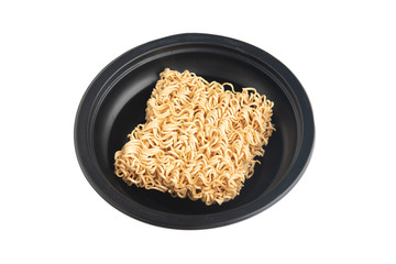 Instant noodles in a black Bowl. Isolated on white