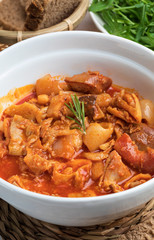Tripes in clay pot. Top view. Rustic appearance. (Callos a la Madrileña).
