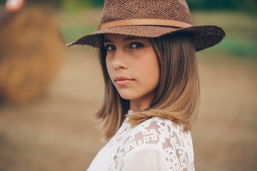 Teen girl hay. Dream. Meadow. Little girl. Nature. Portrait. 