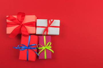 Different colored gift box on color background. Top view of various present boxes on minimal background. Birthday, Christmas, wedding, valentine, romantic gifts - Image