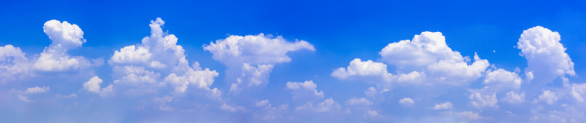 Naklejka na ściany i meble Blue sky with tiny clouds. Panorama