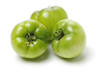 fresh green tomato isolated on white background