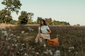 photo session of a girl with a suitcase