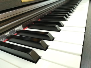 Electric piano keyboard background with selected focus Warm color picture