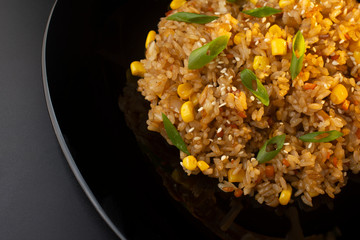 Chinese rice with green onions, carrots and corn