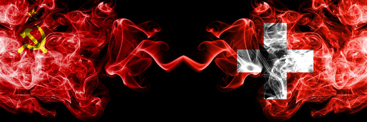 Communist vs Switzerland, Swiss abstract smoky mystic flags placed side by side. Thick colored...