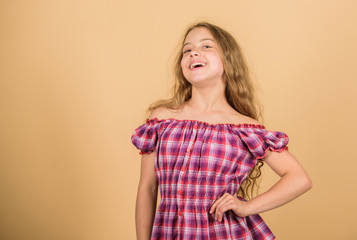 Happiness concept. Little girl happy smiling. Adorable beauty model with cute smile. Happy childhood. Positive emotions. Be positive and keep smiling. Small child long hair cheerful smiling face