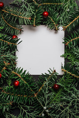 Fototapeta na wymiar Frame of Christmas tree branches and decorations.