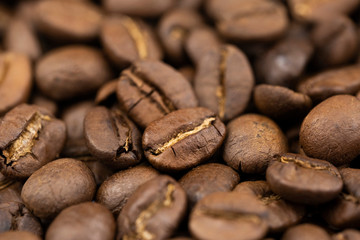 Roasted coffee beans background, Close Up mixture of different kinds of coffee beans.