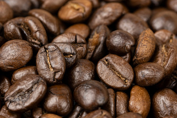 Roasted coffee beans background, Close Up mixture of different kinds of coffee beans.