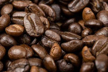 Roasted coffee beans background, Close Up mixture of different kinds of coffee beans.