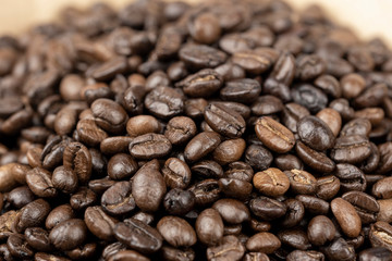 Roasted coffee beans background, Close Up mixture of different kinds of coffee beans.