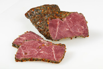 Tasty meat sausages over white background