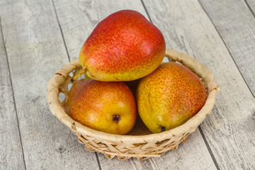Pear heap in the wooden basket