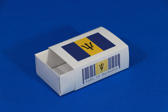 Barbados flag on white box with barcode and the color of nation flag on blue background, paper packaging for put match or products.