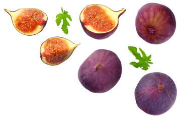 Fig fruit with green leaf and slices isolated on white background Top view