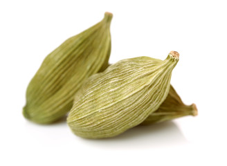 Green cardamom pods. Food, heap.
