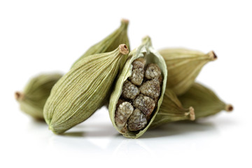 Green cardamom pods. Food, heap.