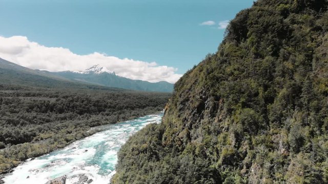 Forest, rapids and volcano Osorno, Patagonia landscape of Saltos de Petrohue, the region of Los Lagos, Chile. 4k