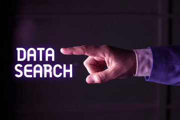 Handwriting text writing Data Search. Conceptual photo gathers and reports information contains specified terms Isolated hand pointing with finger. Business concept pointing finger