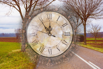  Big clock on a background of autumn nature