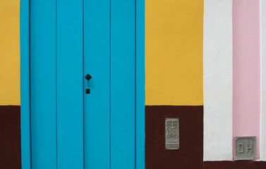 Colorful door and wall in Cuba