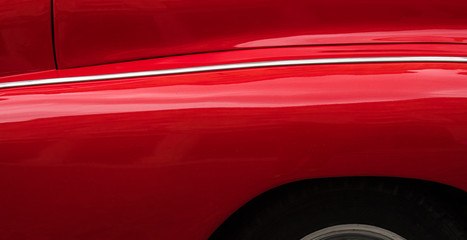 Detail of a red vintage car in Cuba