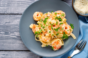 Top view of tasty shrimp fettuccine alfredo