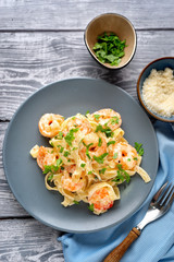 Top view of tasty shrimp fettuccine alfredo