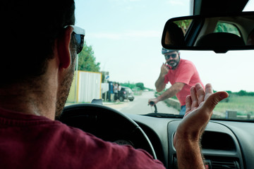 a driver having a problem with a man in an electric scooter © alvaro