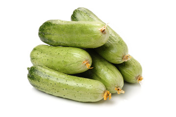 Green cucumber on the white background