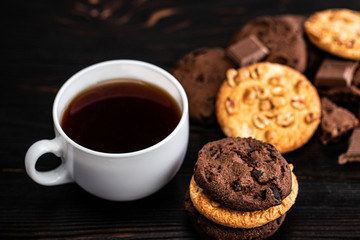 Chocolate cookies on wooden table.Homemade food on wooden background