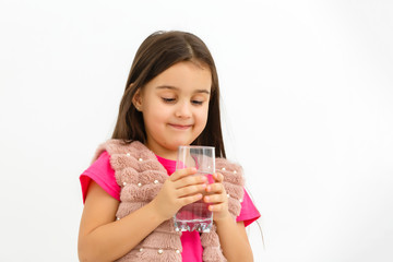 School girl portrait with water glass isolated