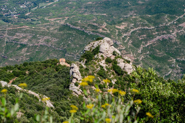 Montserrat mountain and monastery near Barcelona rocks with greens on it