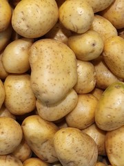 pile of fresh potatoes in the market