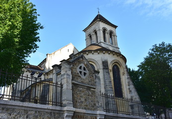 Fototapeta na wymiar Church of Saint Pierre de Montmartre with blue sky. Paris, France.