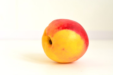 fresh peach on a white background