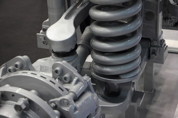 Modern truck spring suspension close up - leverage, disc brake caliper, wheel hub