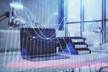 Forex graph hologram with desktop office computer background. Double exposure. Concept of financial analysis.