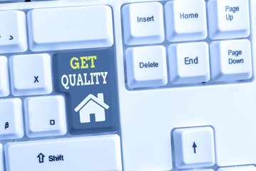 Text sign showing Get Quality. Business photo showcasing features and characteristics of product that satisfy needs White pc keyboard with empty note paper above white background key copy space