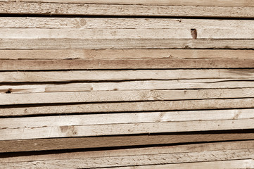 Stack of many Obsolete plywood hardwood plank timber stacked in a row. Abstract texture background. Copy Space