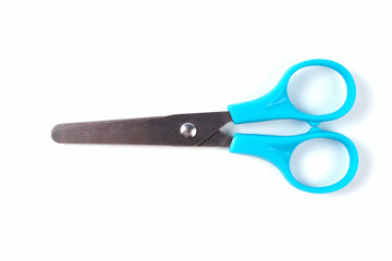 Small blue scissors on a white background