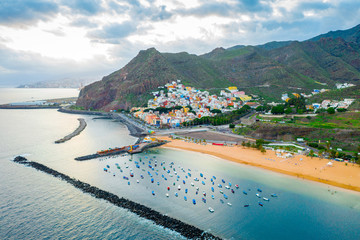 Aerial View of Famous Beach and Ocean Lagoon Playa de las Teresitas at Sunset Time, Tenerife, Canary Islands, Spain - Image © toyechkina