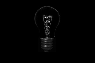 light bulb on black background