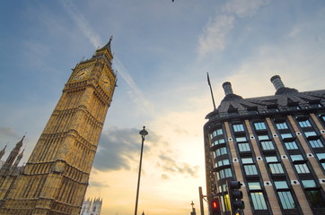 Big Ben, one of the most prominent symbols of both London and England, as shown at night along with the lights of the cars passing by  © Iliya Mitsk