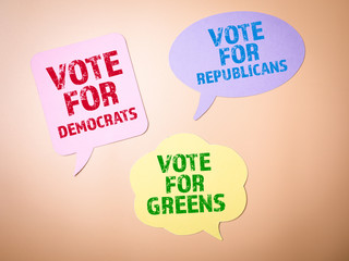 Vote for democrats, republicans or greens. Speech bubble on the background