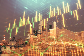 Plakat Double exposure of financial chart on Moscow city downtown background. Concept of stock market analysis